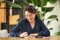 Woman writing down notes on agenda Royalty Free Stock Photo