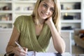 A woman writing in her agenda Royalty Free Stock Photo