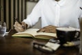 Woman writing her notebook Royalty Free Stock Photo