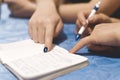 Woman is writing a notes in a notebook. Royalty Free Stock Photo