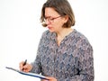 Woman with writing pad Royalty Free Stock Photo