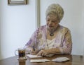 Woman writing thank you notes