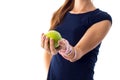 Woman's hand with centimeter around it holding an apple Royalty Free Stock Photo