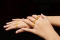 Woman& x27;s hand with many different gold rings