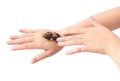 Woman& x27;s hand with scrub coffee grounds on skin hand and arm, bea