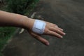 Woman& x27;s hand wound, accidental wound, medical concept, gauze bandage on the hand