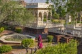 A woman in the yard of the Jaswant Thada mausoleum in Jodhpur, Rajasthan, India Royalty Free Stock Photo