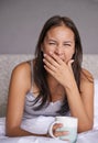 Woman, yawn or coffee in bed for energy to wake up in peace, morning routine for mental health. Tired, sleepy or female Royalty Free Stock Photo