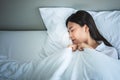 woman, 25 year old, sleeping in white bed But she was terrified, from nightmares Royalty Free Stock Photo