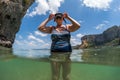 Woman in years going to immerse underwater Royalty Free Stock Photo