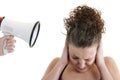 Woman yelled at by a megaphone Royalty Free Stock Photo