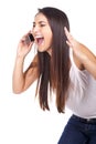 Woman yelling at the phone and looking angry Royalty Free Stock Photo