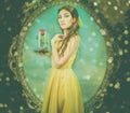 Woman in the yellow dress with red rose in her hands on the background of the mirror and the castle. Beauty and the beast cosplay Royalty Free Stock Photo