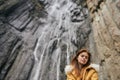 woman yellow jacket tourism mountains adventure landscape Royalty Free Stock Photo