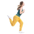 Woman in yellow pants smiling happiness goes walking running Royalty Free Stock Photo