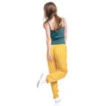 Woman in yellow pants smiling happiness goes walking Royalty Free Stock Photo