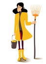 Woman in yellow raincoat with a fan rake and bucket of apples. A gardener with her own harvest. Vector autumn