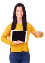 Woman in yellow sweater shows touch screen