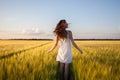 Woman in yellow wheat field Royalty Free Stock Photo