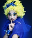 Woman with yellow wig feather Royalty Free Stock Photo