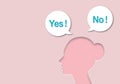 Woman with Yes sign and No on cutout paper speech bubble and pink background, showing negative answer and positive. Royalty Free Stock Photo