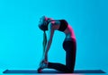 Woman yoga exercices Ustrasana camel pose