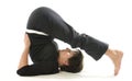 Woman yoga halasana the plough