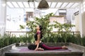 Woman on a yoga mat to relax outdoor Royalty Free Stock Photo