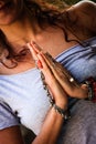 Woman in yoga meditation closeup with lot of rings and bracelet Royalty Free Stock Photo