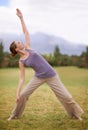 Woman, yoga and pilates on field in nature for outdoor workout, exercise or health and wellness. Young female person or Royalty Free Stock Photo