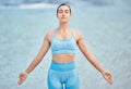 Woman, yoga and relax on beach for meditation, spiritual wellness or outdoor zen exercise. Calm female person or yogi Royalty Free Stock Photo