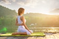 Woman Yoga - relax in nature Royalty Free Stock Photo