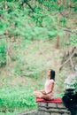 Woman Yoga, relax in nature. Forest summer Royalty Free Stock Photo