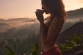 Woman Yoga Retreat at a Beautiful Bali Resort with Stunning Sunrise and Volcano Views