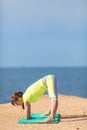 Woman yoga. Series. Outdoor. On the seashore Royalty Free Stock Photo