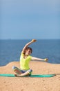 Woman yoga. Series. Outdoor. On the seashore Royalty Free Stock Photo