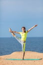 Woman yoga. Series. Outdoor. On the seashore Royalty Free Stock Photo