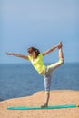 Woman yoga. Series. Outdoor. On the seashore Royalty Free Stock Photo