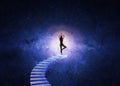 Woman yoga stairs to the universe