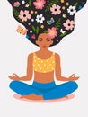 Girl with flowers on her head in her hair. The concept of a free mind, a positive mind, a blooming brain.