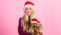 Woman and yorkshire terrier wear santa hat. Celebrate christmas with pets. Reason love christmas with pets. Ways to have Royalty Free Stock Photo