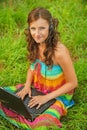 Woman young beautiful laptop headphones