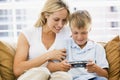 Woman and young boy in living room Royalty Free Stock Photo