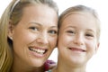 Woman and young girl smiling Royalty Free Stock Photo