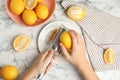 Woman zesting lemon at white marble table, top view Royalty Free Stock Photo