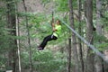 Woman ziplining