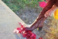 Woman zips up her boots. Royalty Free Stock Photo