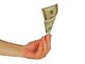 Womanish hand holds a money note