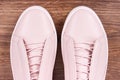 Womanly leather shoes on board. Wooden background Royalty Free Stock Photo