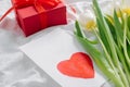 Womans day, mothers day concept. White tulips, gift present, greeting card with text I love mom Royalty Free Stock Photo